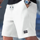 Calções Casuais Masculinos com Textura, Cintura com Cordão, Tecido Leve de Poliéster, Bolsos para Uso Diário, Praia ou Atividades ao Ar Livre | Calções com Cordão | Calções Leves